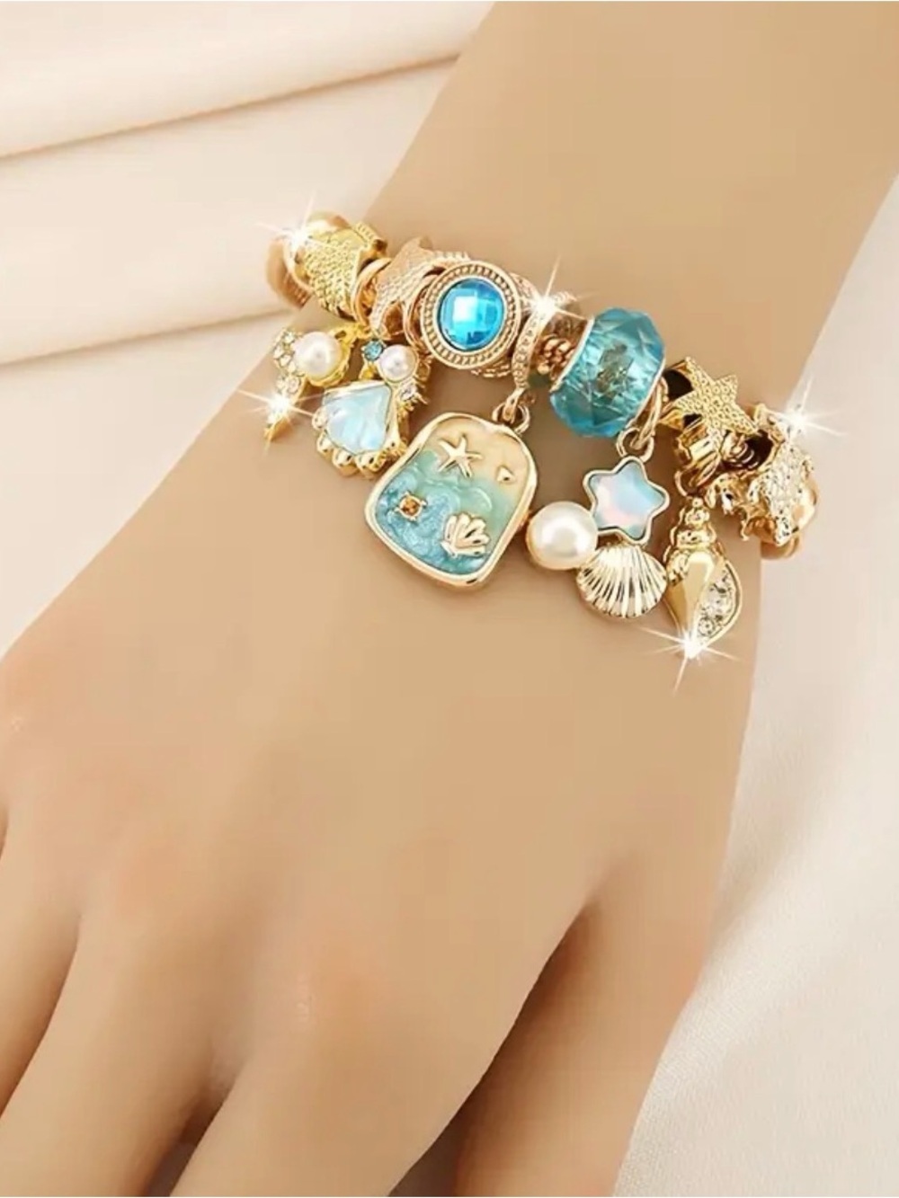 Gold-Tone Beach Charm Turquoise Bracelet.